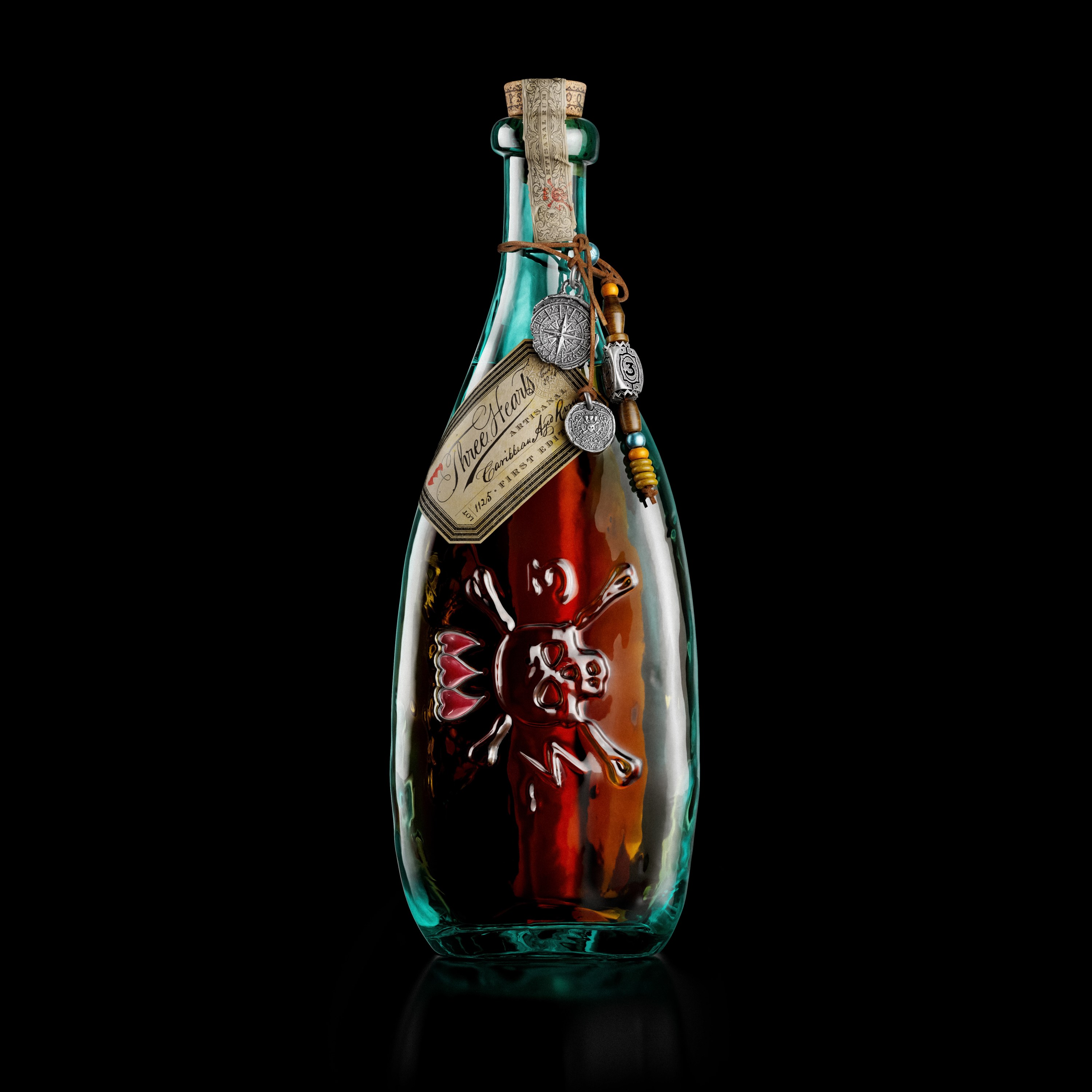 Johnny Depp Unveils Three Hearts Rum, a Bottle Inspired by Tattoos, Friendship and “the Three Loves of His Life”